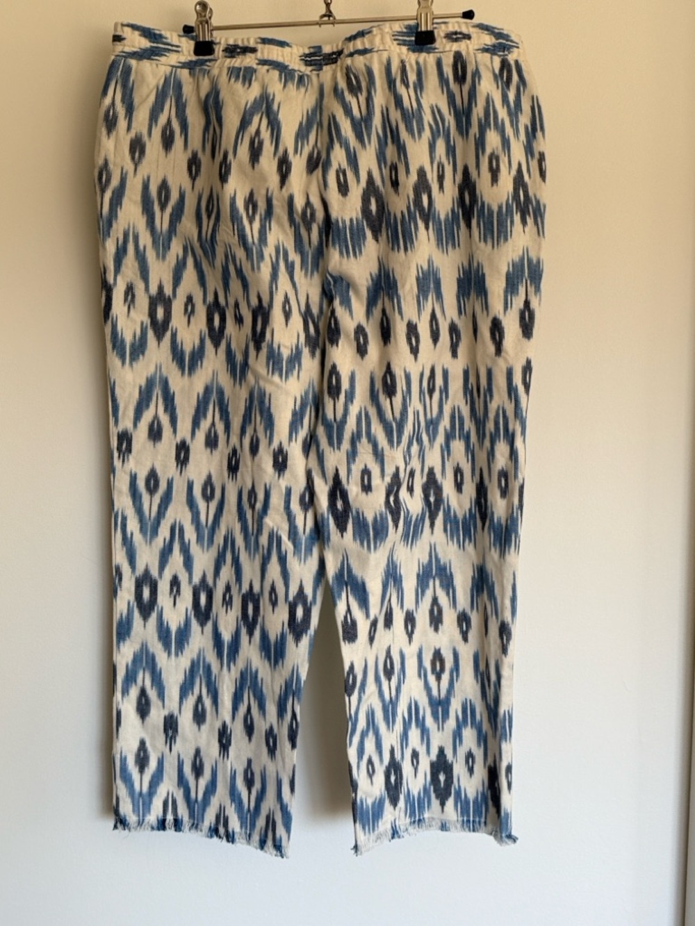 Blue and ivory ikat pants by Anthropologie